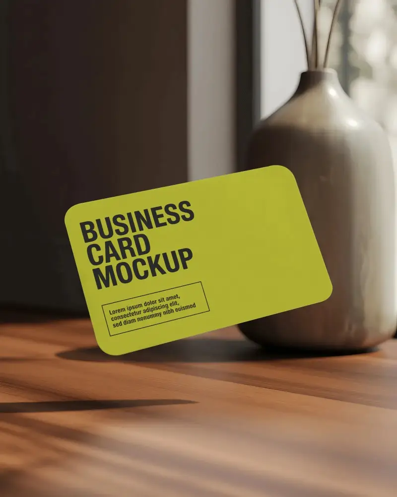 floating-minimalist-business-card-mockup-on-wooden-table-with-decorative-vase-background