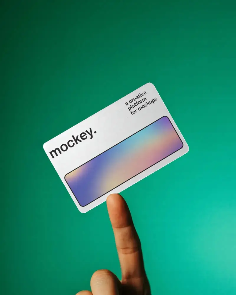 Professional Blank Business Card Mockup On Human Finger For Brochure Designs