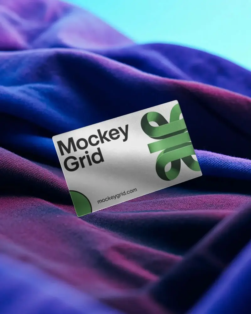 Premium Metal Business Card Mockup Displayed On Velvety Smooth Draped Cloth Background