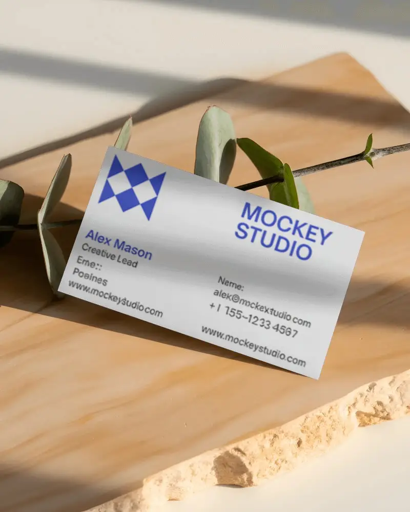 Modern Minimal Business Card Mockup On Stylish Wooden Surface With Greenery Element