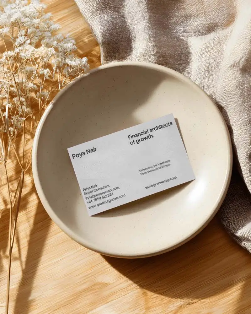 Elegant Business Card Mockup On Round Plate With Dry Floral Decor And Wood Table