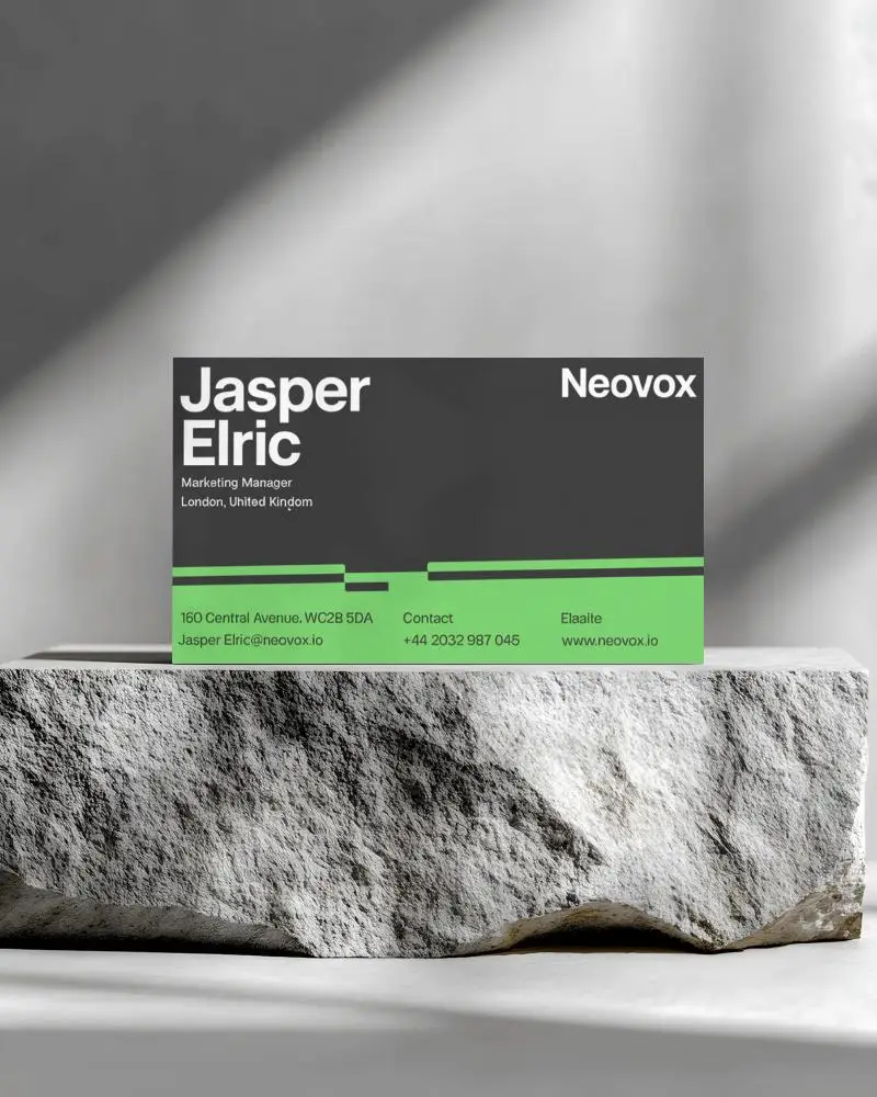 Business Card Mockup Positioned On Rustic Rock Base With Subtle Light Shadow Play