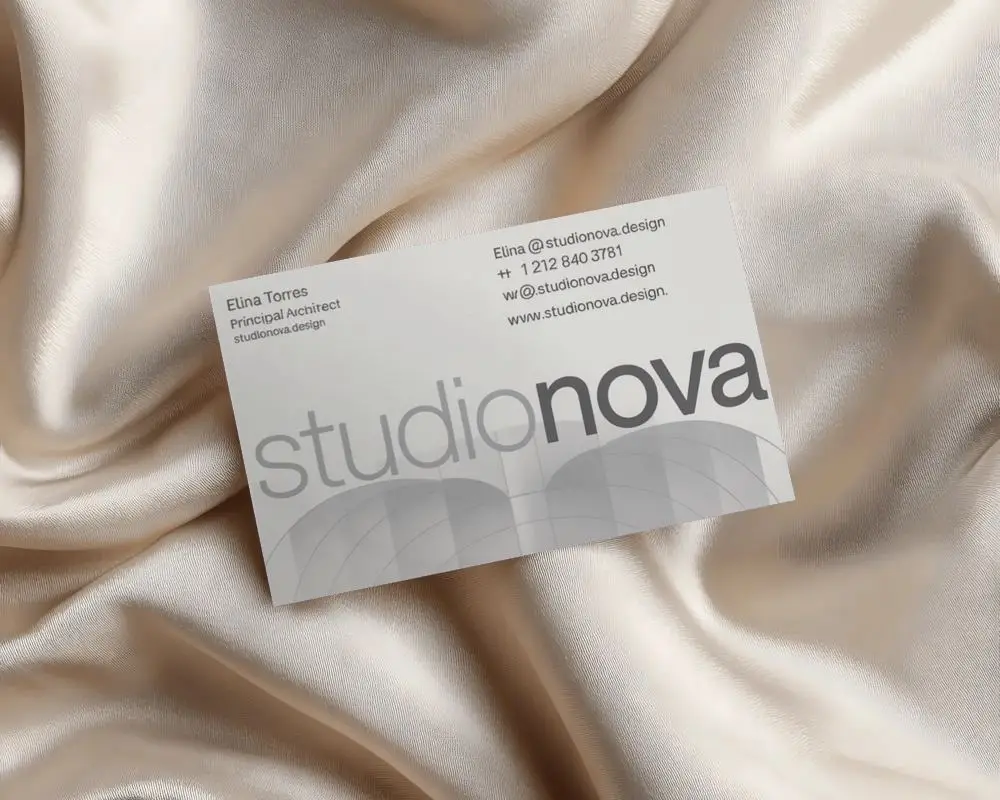 Premium Business Card Mockup Floating On Sleek Satin Fabric Background For Design Presentation