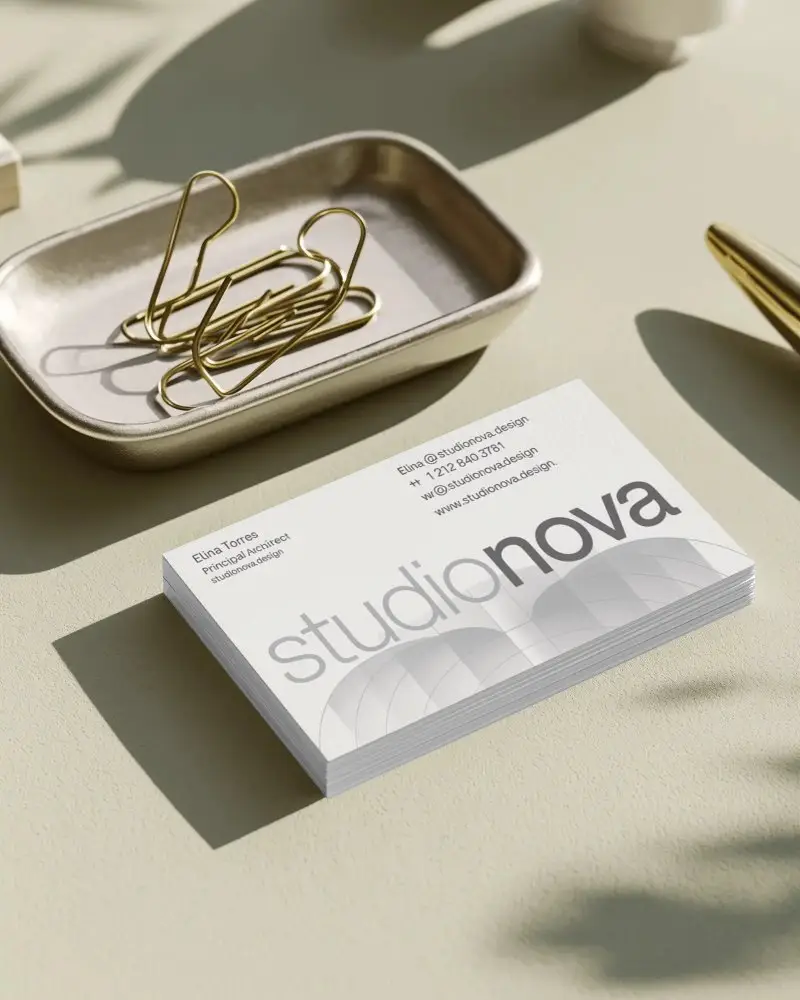 Realistic Clean Business Card Mockup On Flat Surface With Subtle Shadows And Golden Paperclips