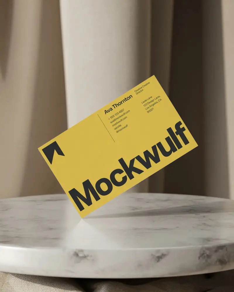 Professional Floating Business Card Mockup On Round Marble Display With Neutral Backdrop