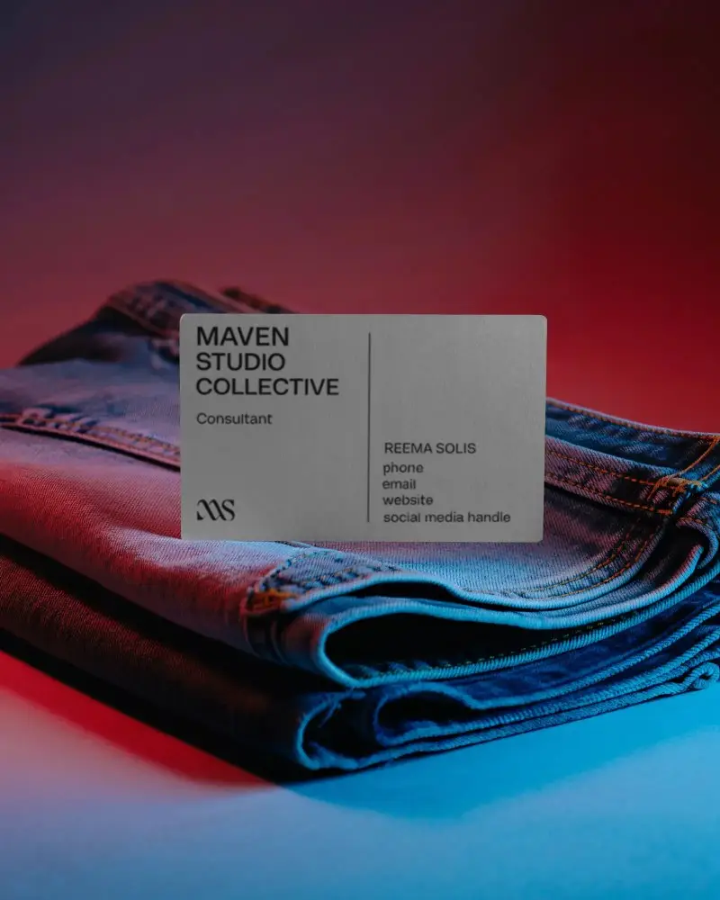 Blank Business Card Mockup On Folded Denim Fabric For Fashion Brand Presentation