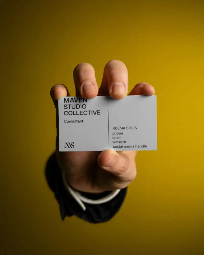 Professional Business Card Mockup In Hand Isolated On Solid Background Ideal For Branding