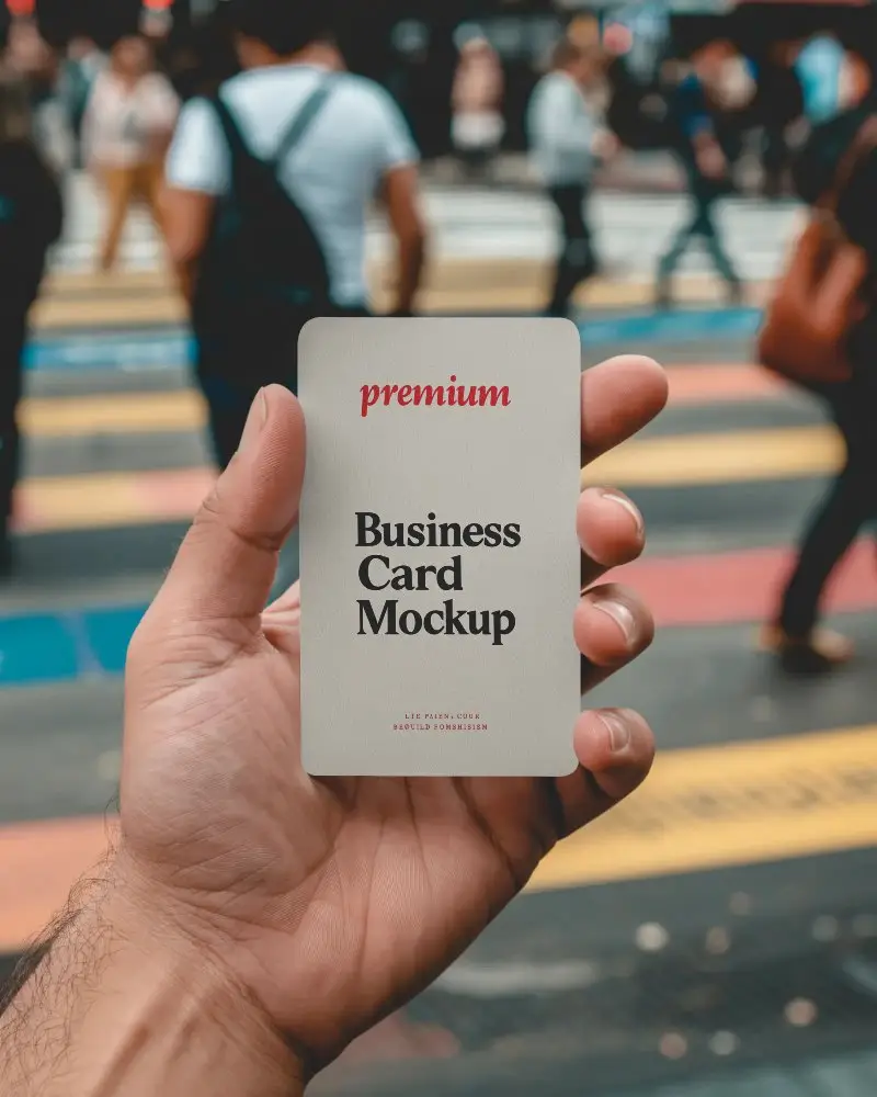 Hand Holding Blank Business Card Outdoor Street Crossing Background Mockup Template