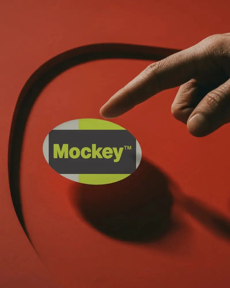 Minimalistic Round Business Card Mockup With Hand Hovering Over Modern Background