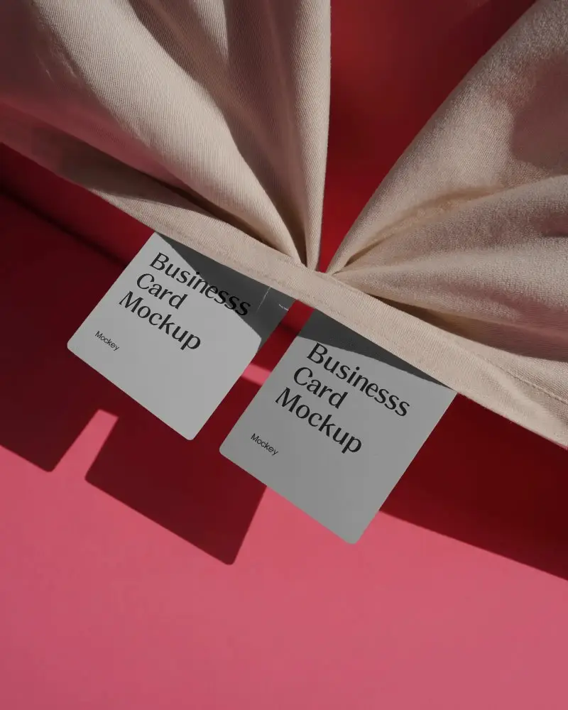 Minimalist Business Card Mockup With Sharp Corners Hanging On Textured Fabric