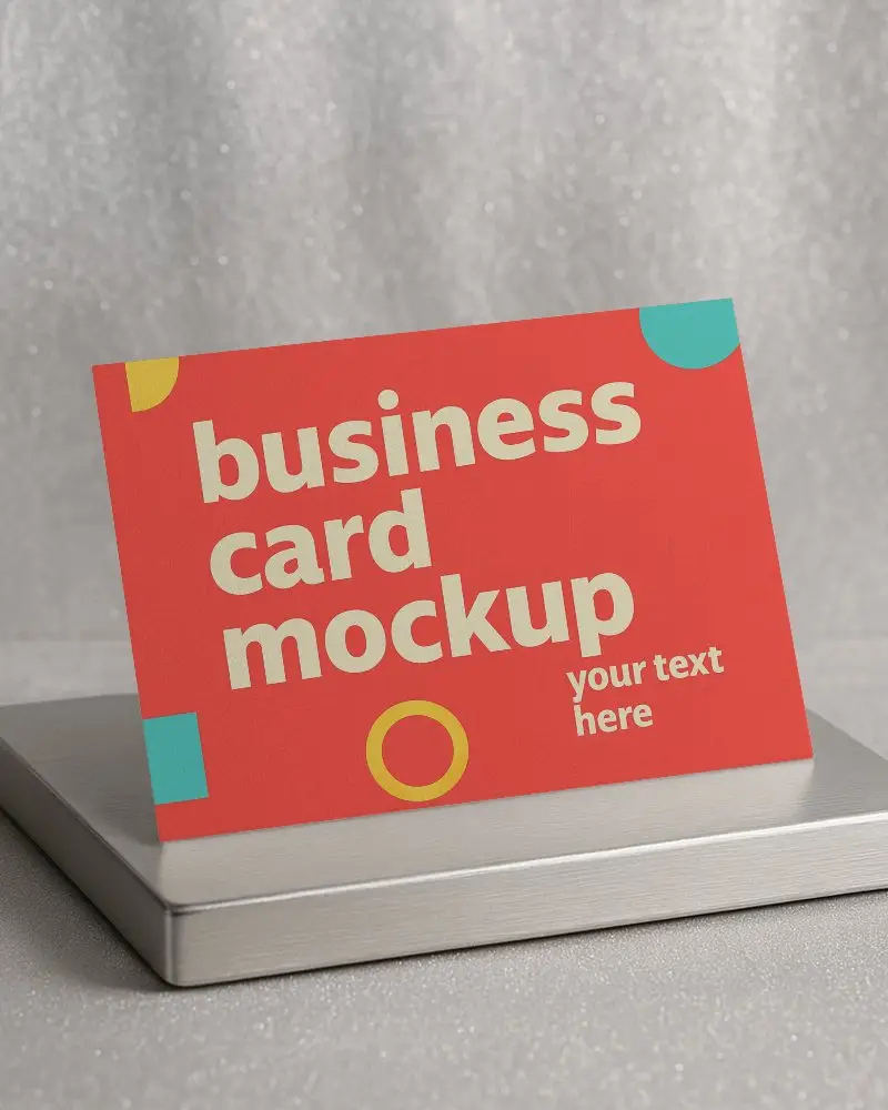 Angled Business Card Mockup On Metallic Stand With Soft Silver Sparkle Background