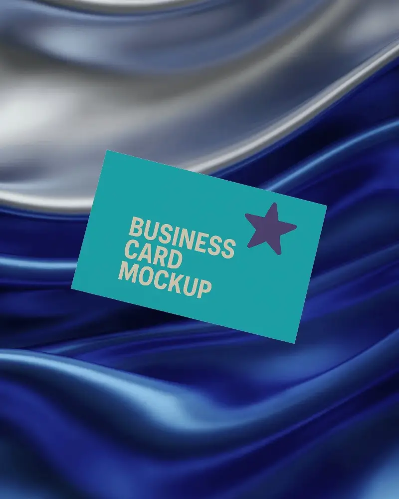 Silky Blue Fabric Business Card Mockup Floating On Luxurious Satin Waves In Modern Product Scene