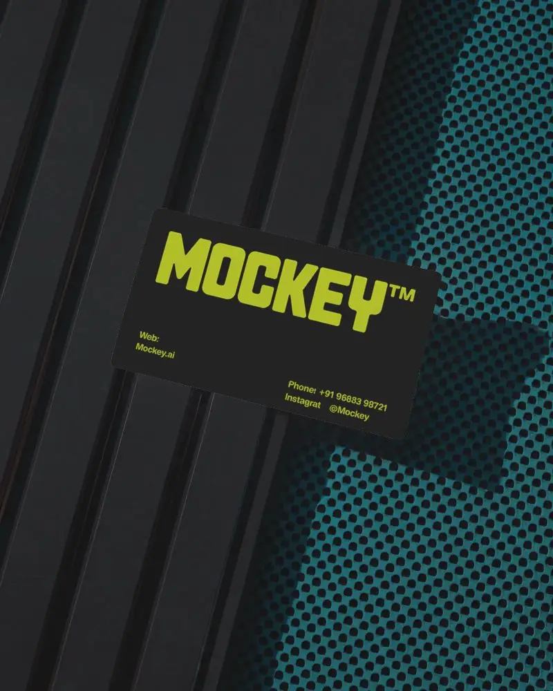 Angled Black And Teal Metal Business Card Mockup On Industrial Grid Background