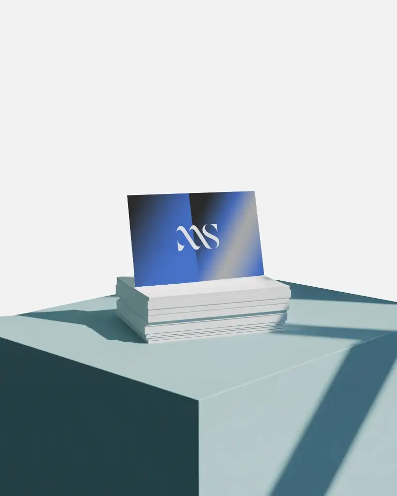 Professional Branding Business Cards Arranged On Modern Solid Surface Background