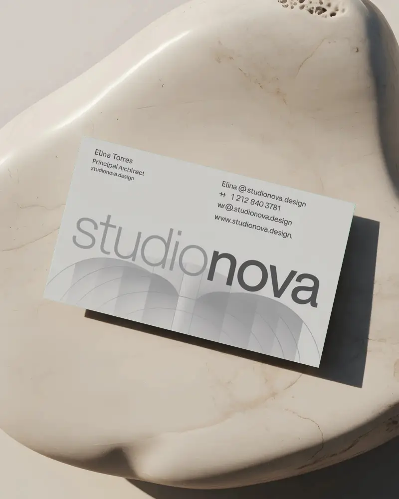 sleek-simple-business-card-mockup-floating-on-fine-grained-marble-texture-surface