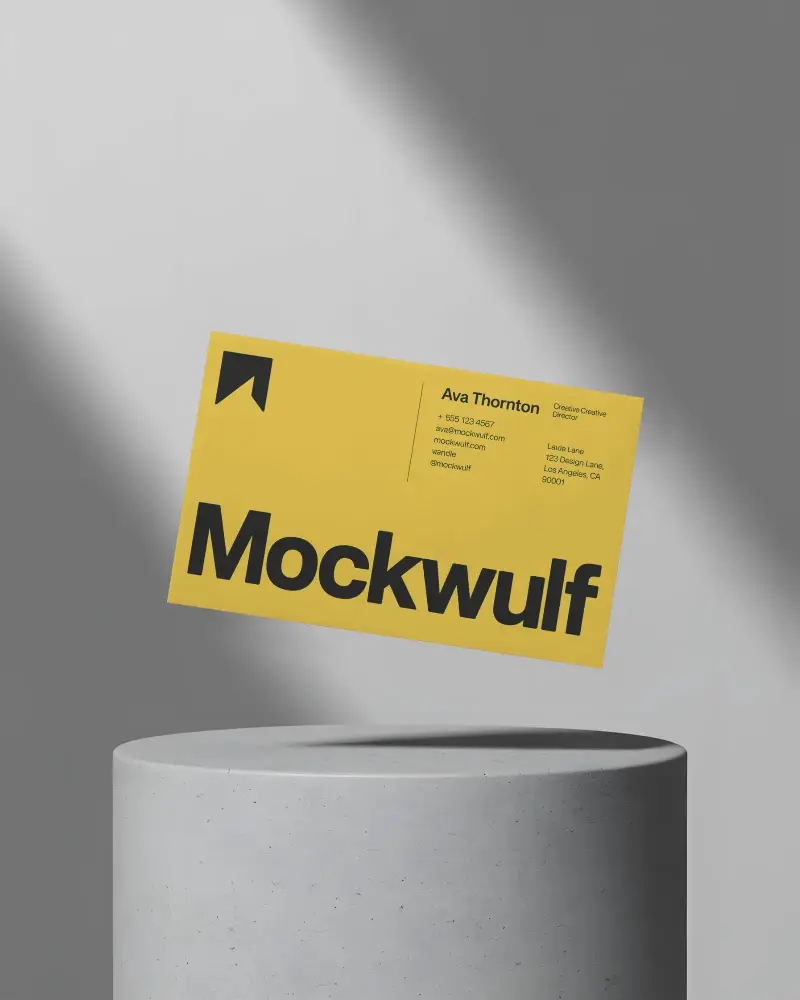Minimalistic Floating Business Card Mockup Over Round Cement Pedestal With Soft Shadow