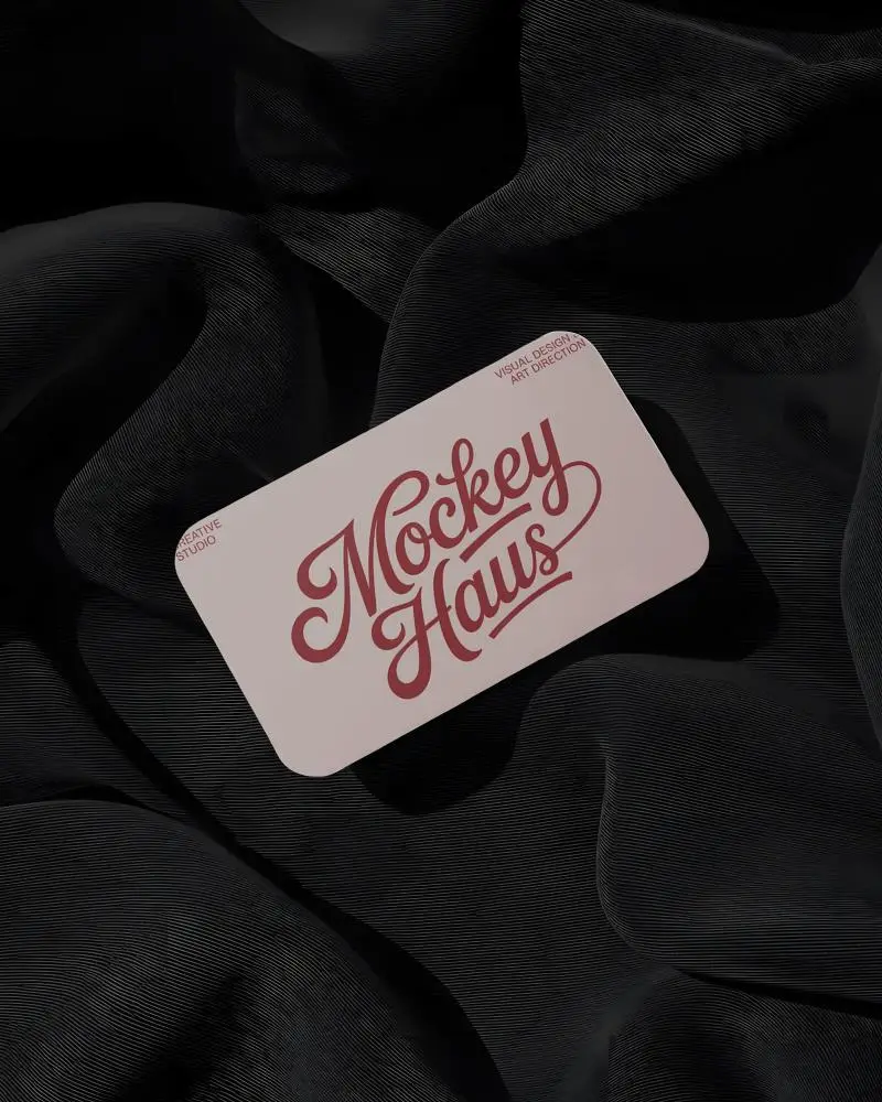 Modern Plain Business Card Template With Rounded Corners On Wavy Fabric Surface Mockup