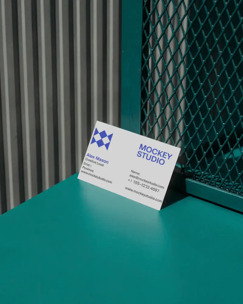 Urban Business Card Mockup Against Green Metal Grid And Industrial Striped Wall Textures
