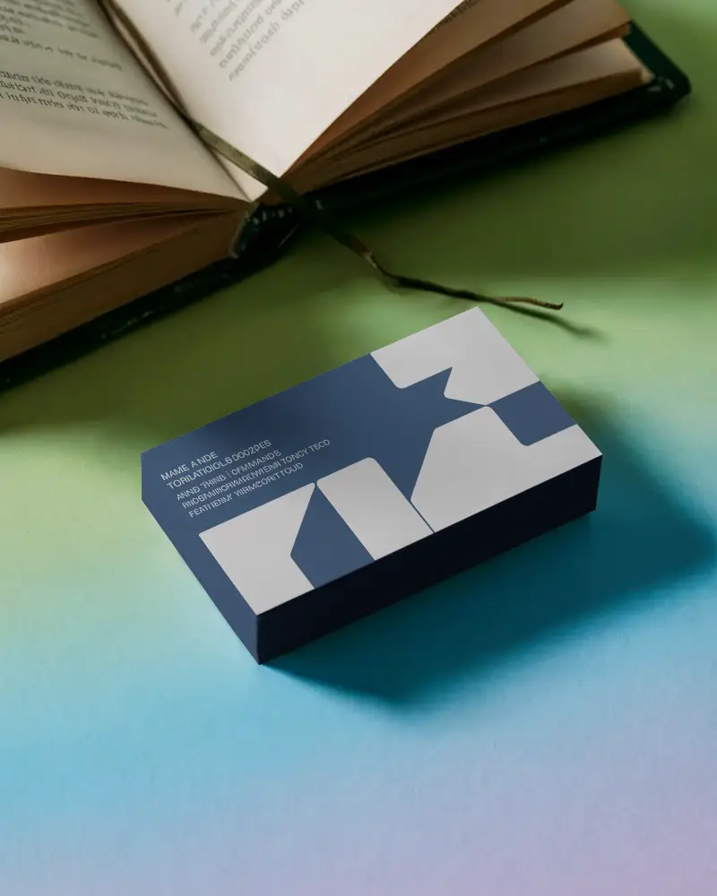 Creative Reading Business Card Mockup Stack Placed Beside Open Book On Gradient Surface