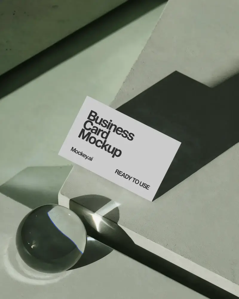 Abstract Green Horizontal Business Card Mockup On Angled Blocks With Glass Sphere Light Shadow