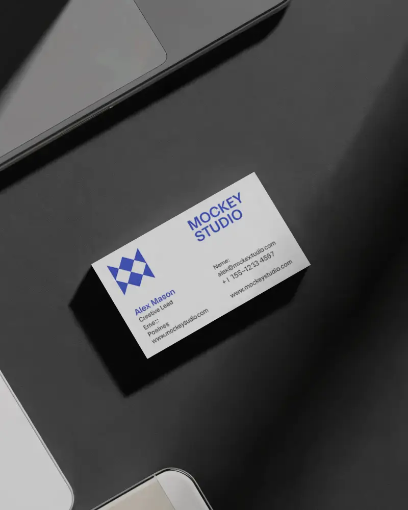Dark Surface Business Card Mockup With Laptop Accessories Modern Tech Inspired Layout