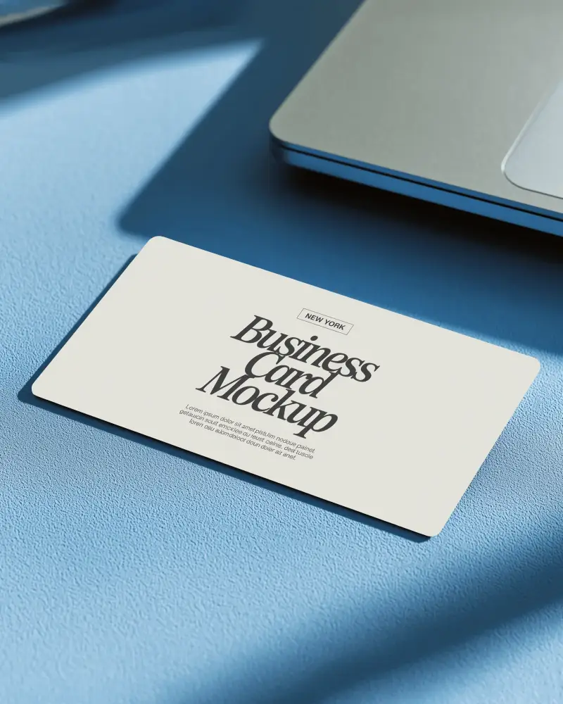Light Blue Surface Horizontal Business Card Mockup Near Laptop Clean And Bright Modern Style