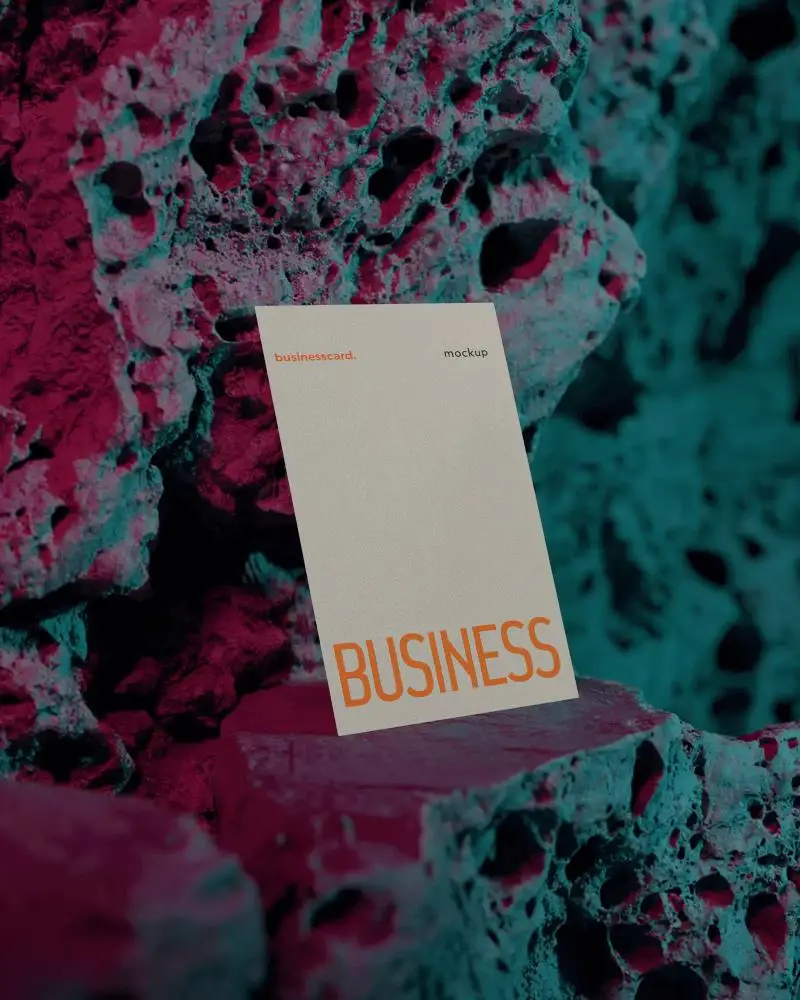 Rocky Surface Vertical Business Card Mockup With Vibrant Red And Teal Lighting Creative Style