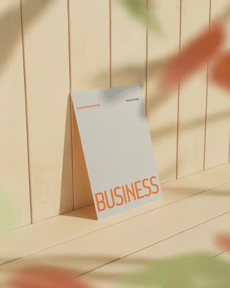 Wooden Wall Business Card Mockup Sunlit Surroundings With Soft Blurred Leaves