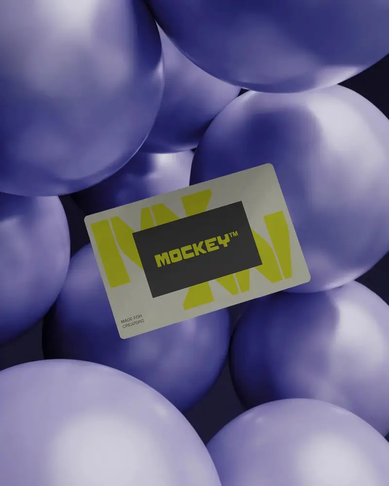 Sleek Minimalist Business Card Mockup Floating Among Smooth Spherical Objects Background