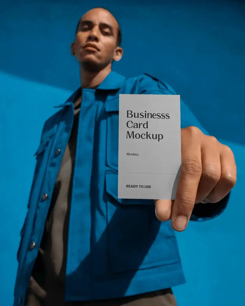 Man Holding Blank Business Card Mockup For Premium Branding And Professional Networking Showcase