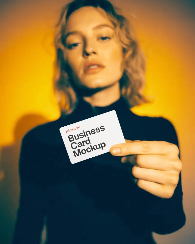 Closeup Business Card Mockup In Hand Ideal For Personalized Branding Presentation