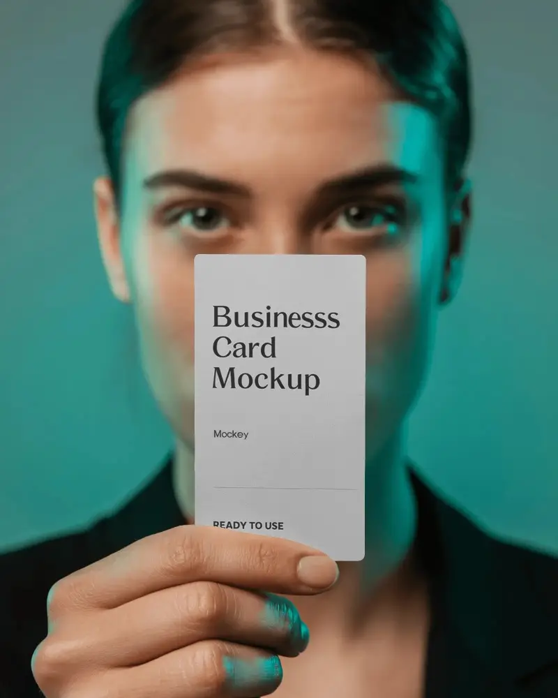 Professional Business Card Mockup Held Closely By Person With Clear Background For Design