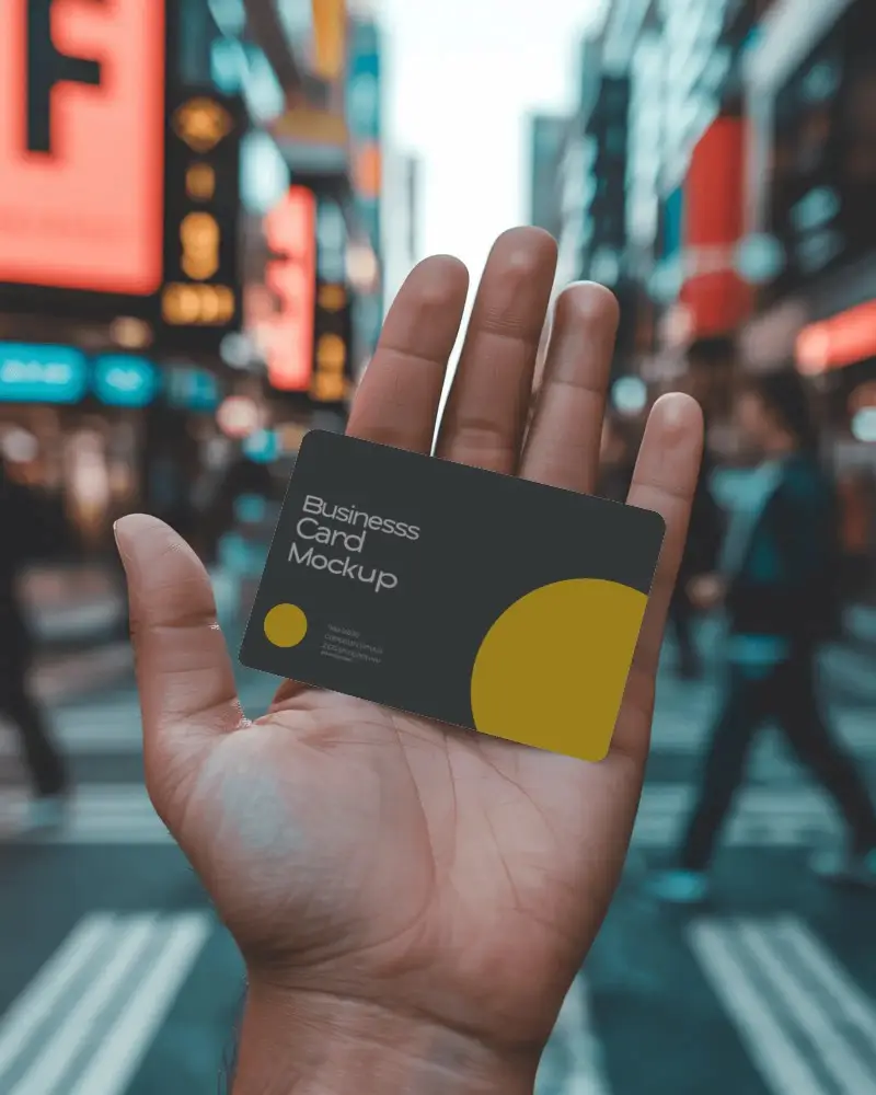 Hand Holding Blank Business Card Street Background Urban Busy Crosswalk Scene