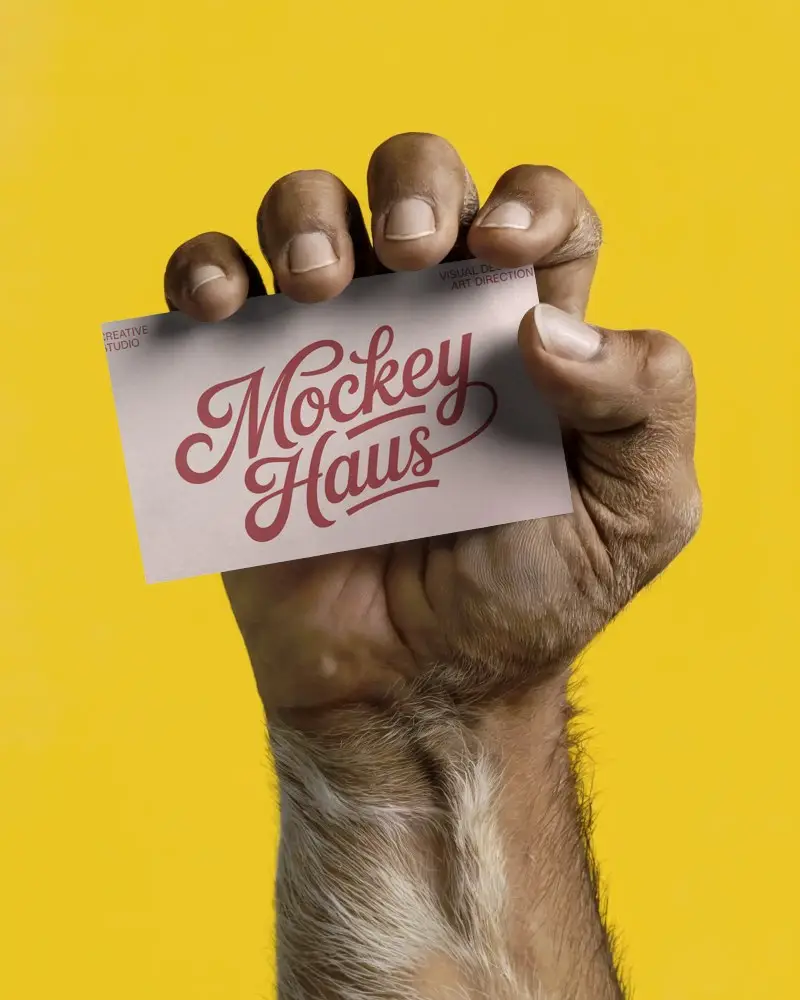 Creative Wildlife Hand Holding Blank Business Card Mockup For Design Display