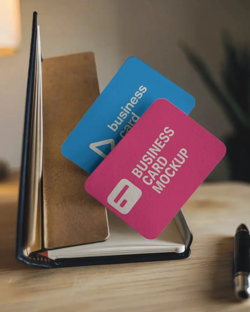 Cozy Desk Business Card Mockup Cards Propped Against Open Notebook In Evening Warm Light 0191