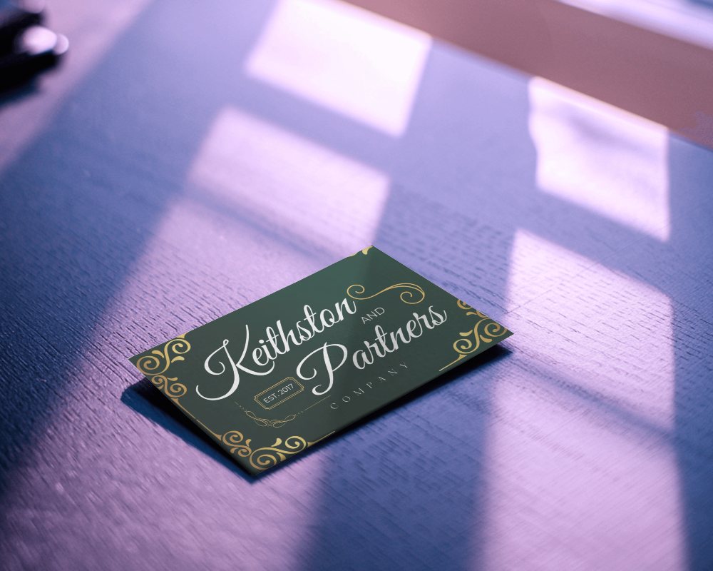 Angled Business Card Placed On Desk With Sunlit Shadows For Soft Natural Lighting Effect