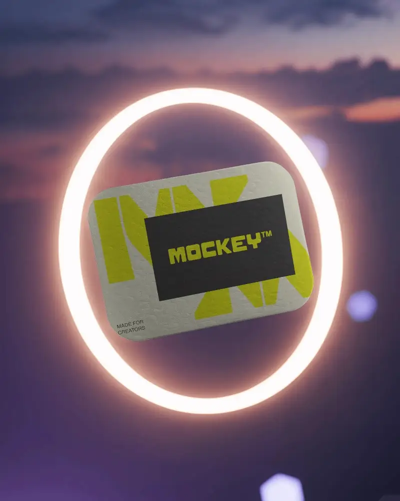 rounded-business-card-mockup-floating-in-glowing-ring-against-dreamy-dusk-sky-backdrop