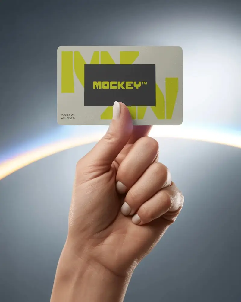 minimal-studio-business-card-mockup-female-hand-showcasing-card-in-radiant-light-arc