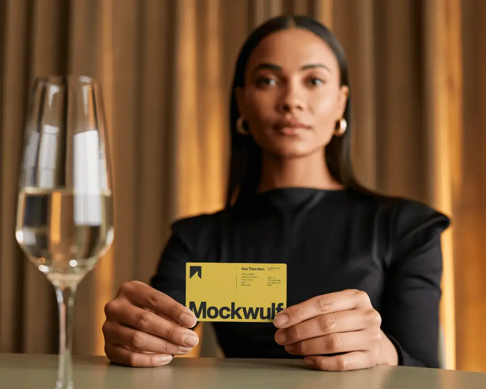 Woman Holding Minimalist Business Card Mockup With Elegant Indoor Background For Showcase