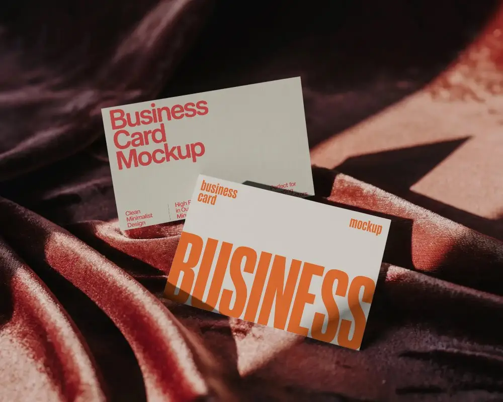 Professional Business Card Mockup Showcasing Clean Cut Edge On Smooth Cloth Surface