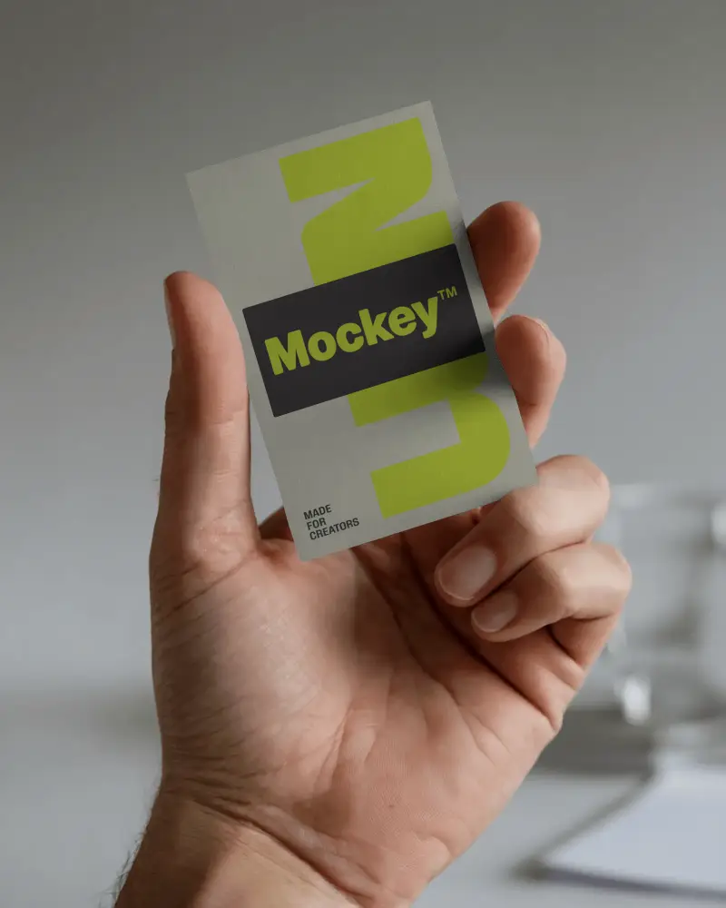 Vertical Handheld Business Card Mockup With Soft Natural Light Clean Studio Scene