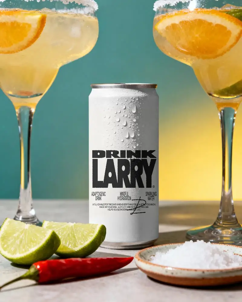 Refreshing Cold Beverage Can Mockup With Citrus Fruits And Salty Garnishes On Table