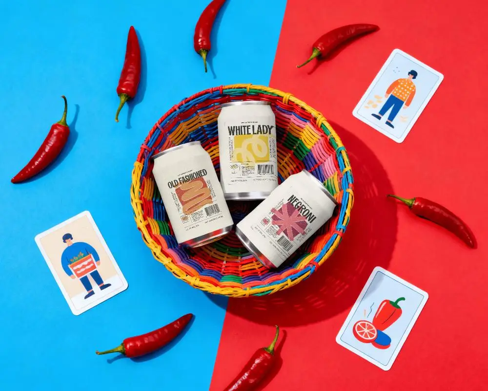 Colorful Flatlay Can Mockup In Woven Basket With Chili Peppers Bold Duotone Background