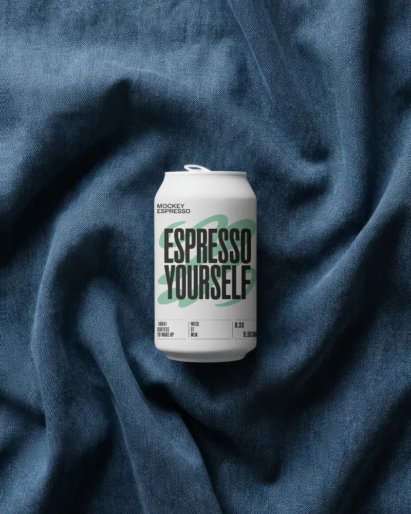 Premium Soda Can Mockup On Textured Fabric For Beverage Branding And Packaging Design