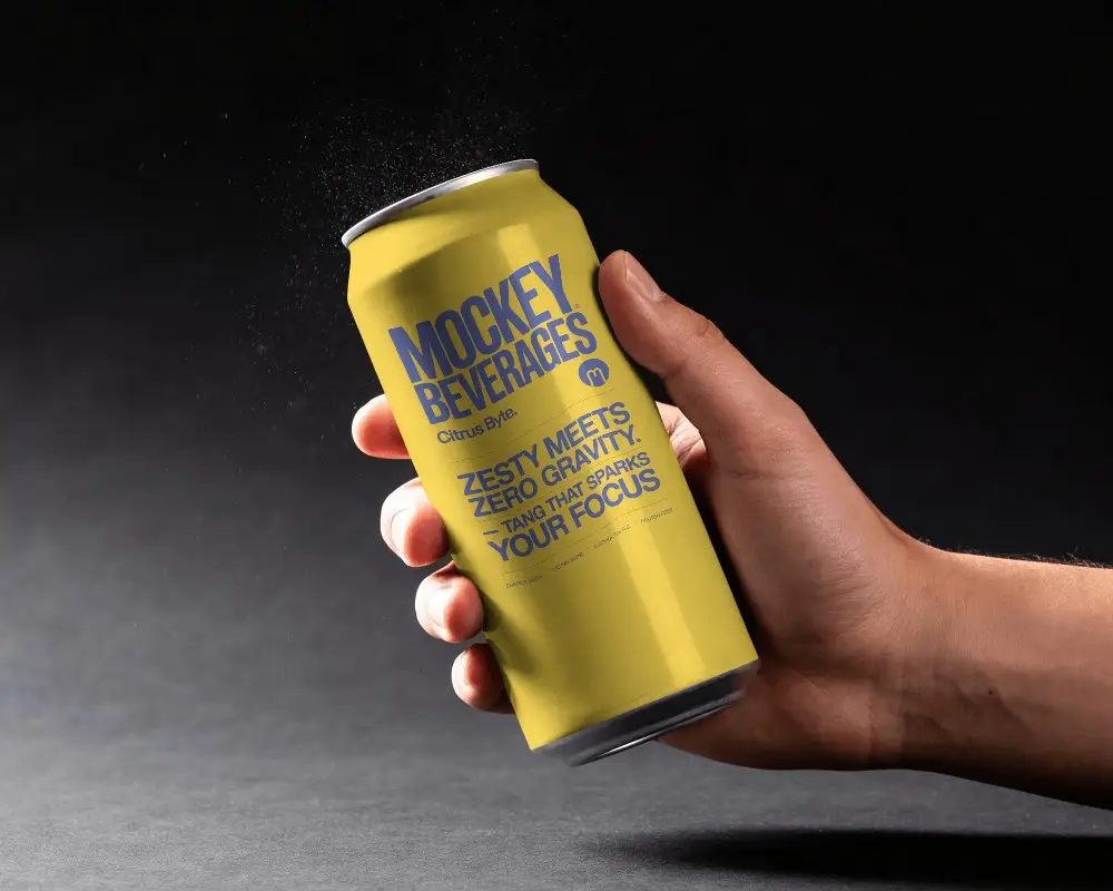 Handheld Soda Can Mockup On Dark Studio Background With Label Area And Dramatic Side Lighting