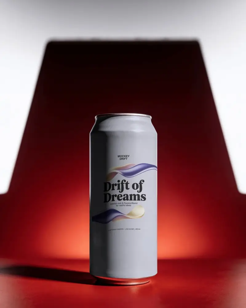 Beer Can Mockup Standing On Deep Red Surface With Glowing Background And Premium Shadow Detail