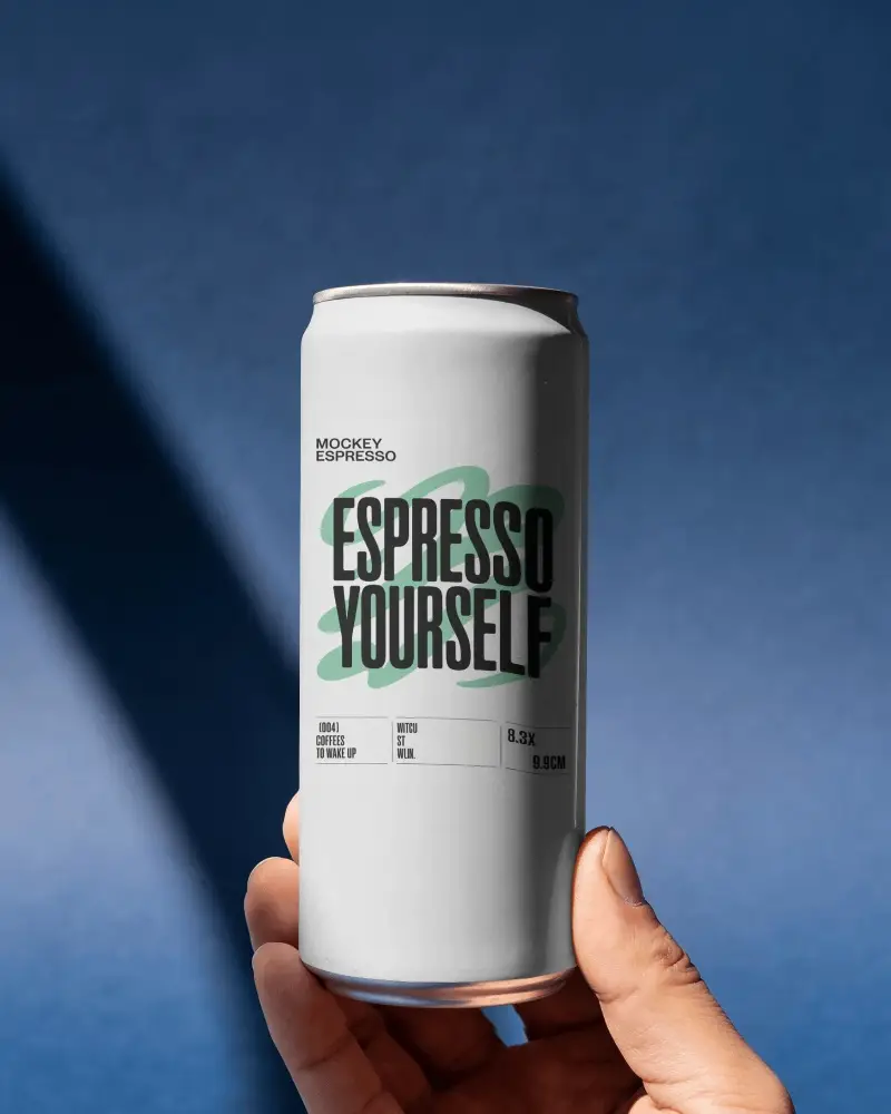 Handheld Coffee Can Mockup On Deep Blue Background With Dramatic Side Shadow And Premium Lighting