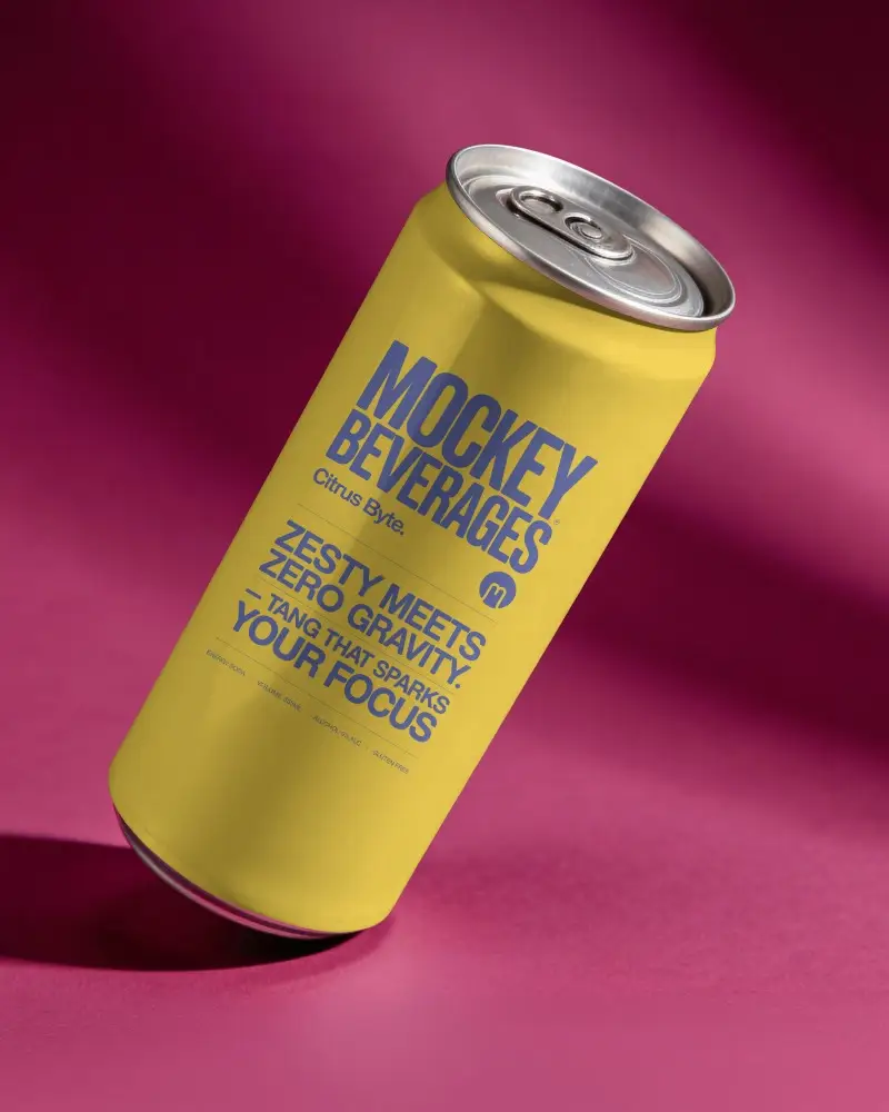 Tilted Beer Can Mockup On Magenta Studio Background With Dramatic Shadow And Premium Lighting