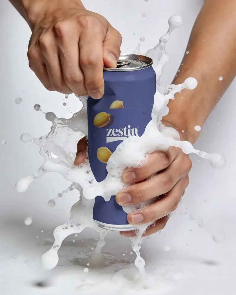 Realistic Soda Can Mockup With Splash Effect For Drink Packaging Presentations