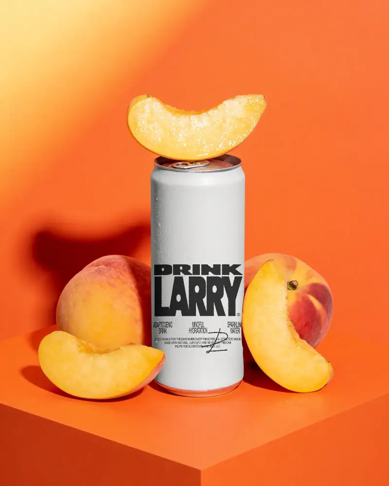 Realistic Soda Can Mockup With Peach Fruit Display For Product Packaging Design Showcase